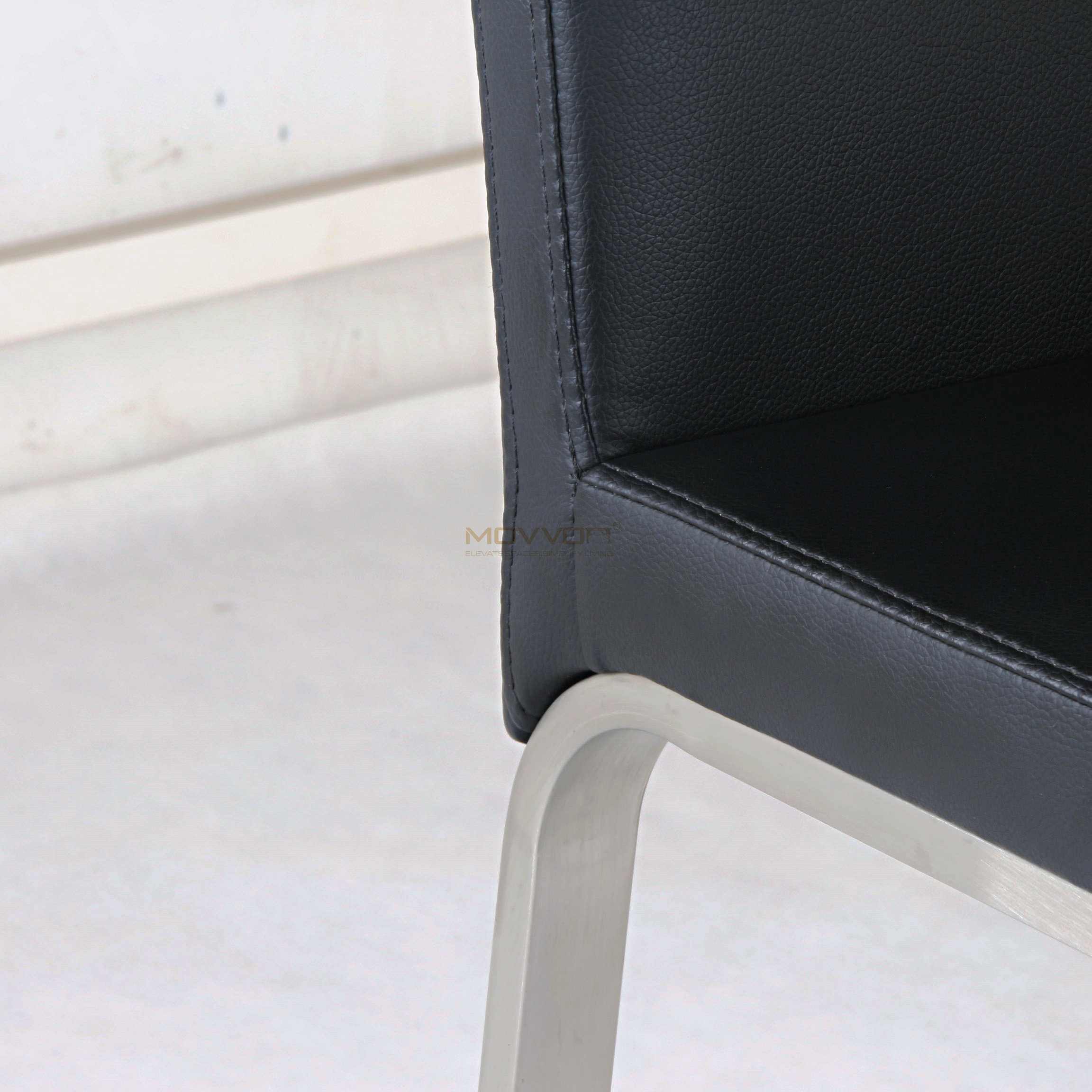 Black Upholstered Bar Chair with Arched Metal Footrest