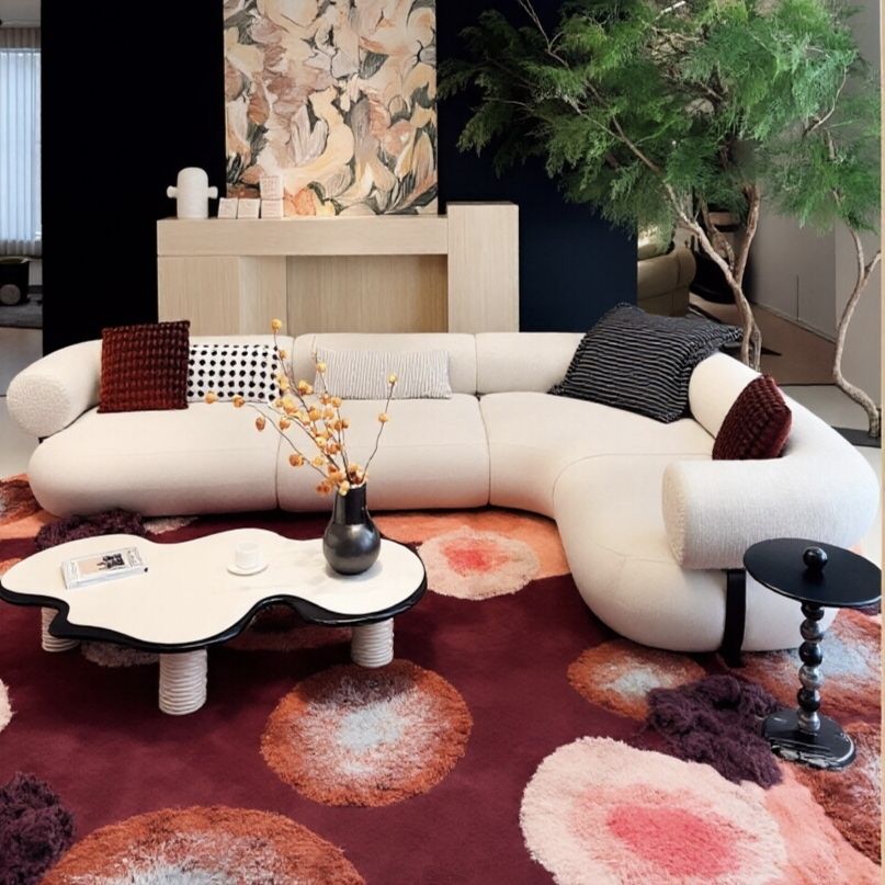 ​Cylindrical Roll-Arm Sectional Sofa, Black Strap Base Detail