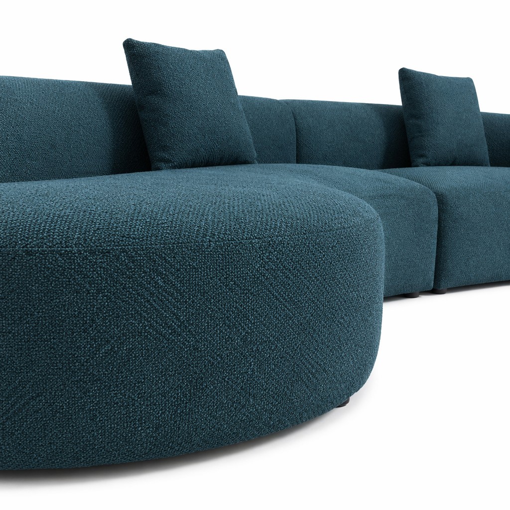 Teal Modular Sofa Centered on a Rounded Chaise Lounge Module