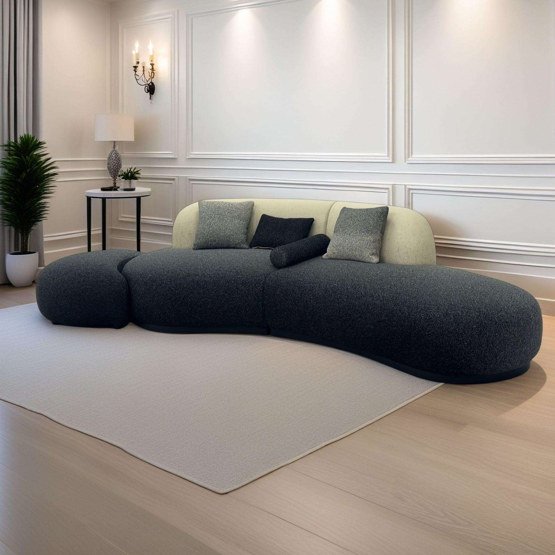 Dark Pebble Chaise Sofa with Cream Back Pillows and Organic Low Form