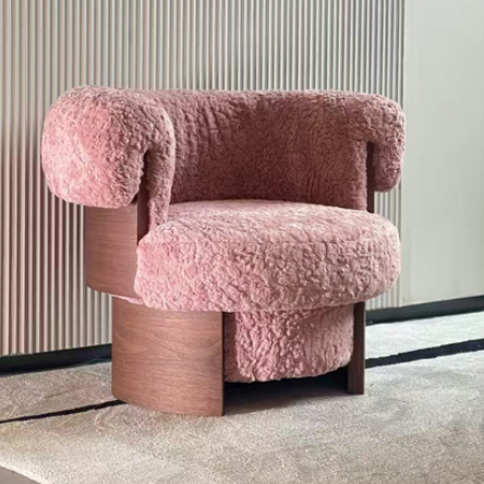 Pink Sherpa Barrel Lounge Chair Framed by Curved Wood Panels